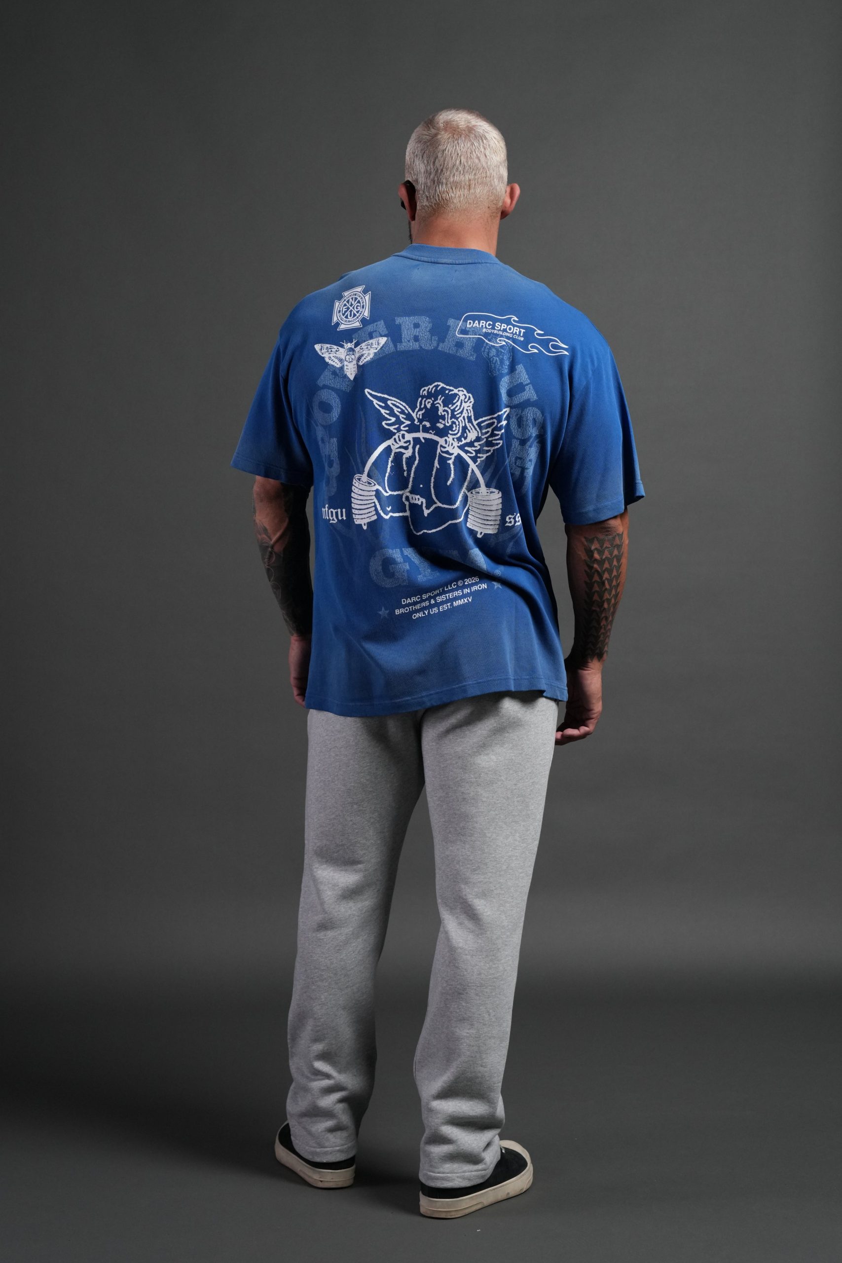 Powerhouse of the Cherub Unisex Premium Oversized Tee in Darc Cobalt Drift Wash - Image 6