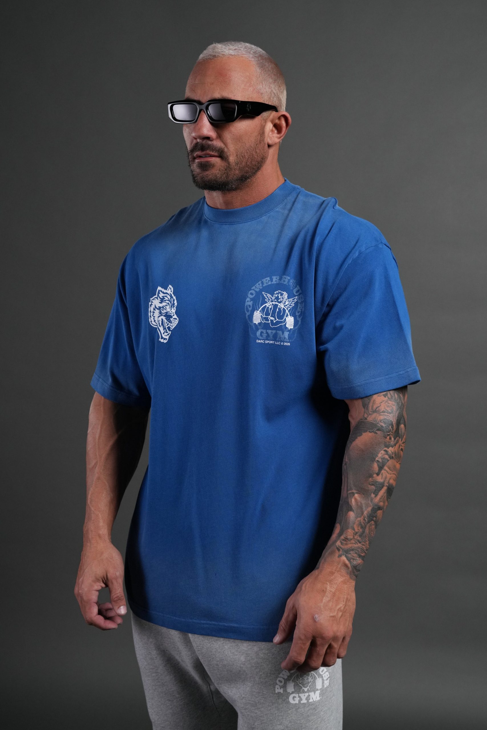 Powerhouse of the Cherub Unisex Premium Oversized Tee in Darc Cobalt Drift Wash - Image 2