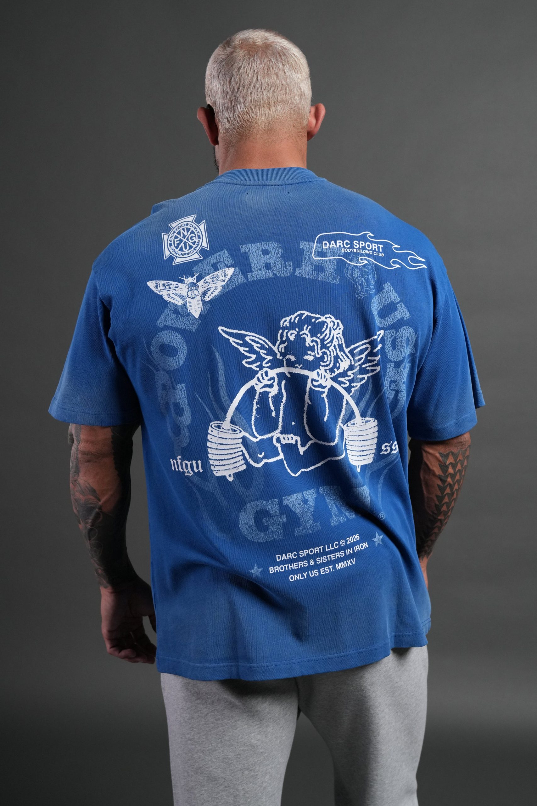Powerhouse of the Cherub Unisex Premium Oversized Tee in Darc Cobalt Drift Wash - Image 4