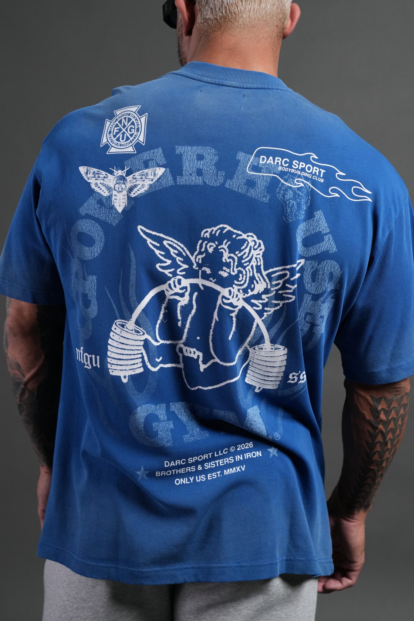 Powerhouse of the Cherub Unisex Premium Oversized Tee in Darc Cobalt Drift Wash - Image 8