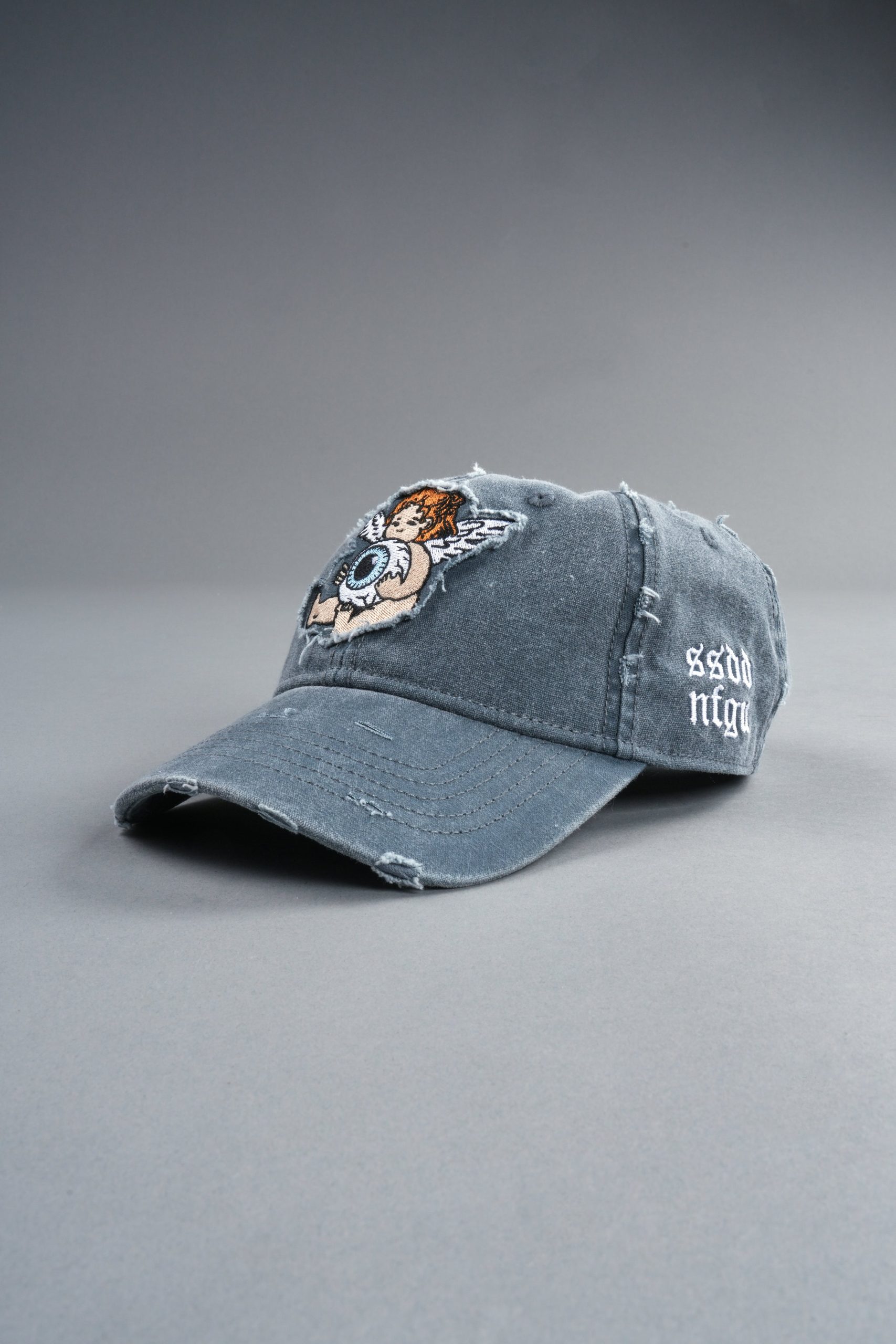 Cherub Eye Ball Distressed Dad Hat in Washed Wolf Gray - Image 13