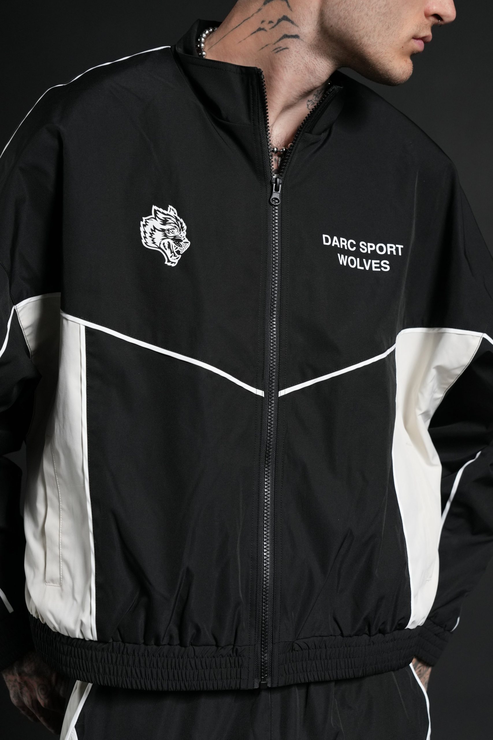 Darc Sport Wolves Unisex Pyramid Quinn Track Jacket in Black/Sand - Image 8