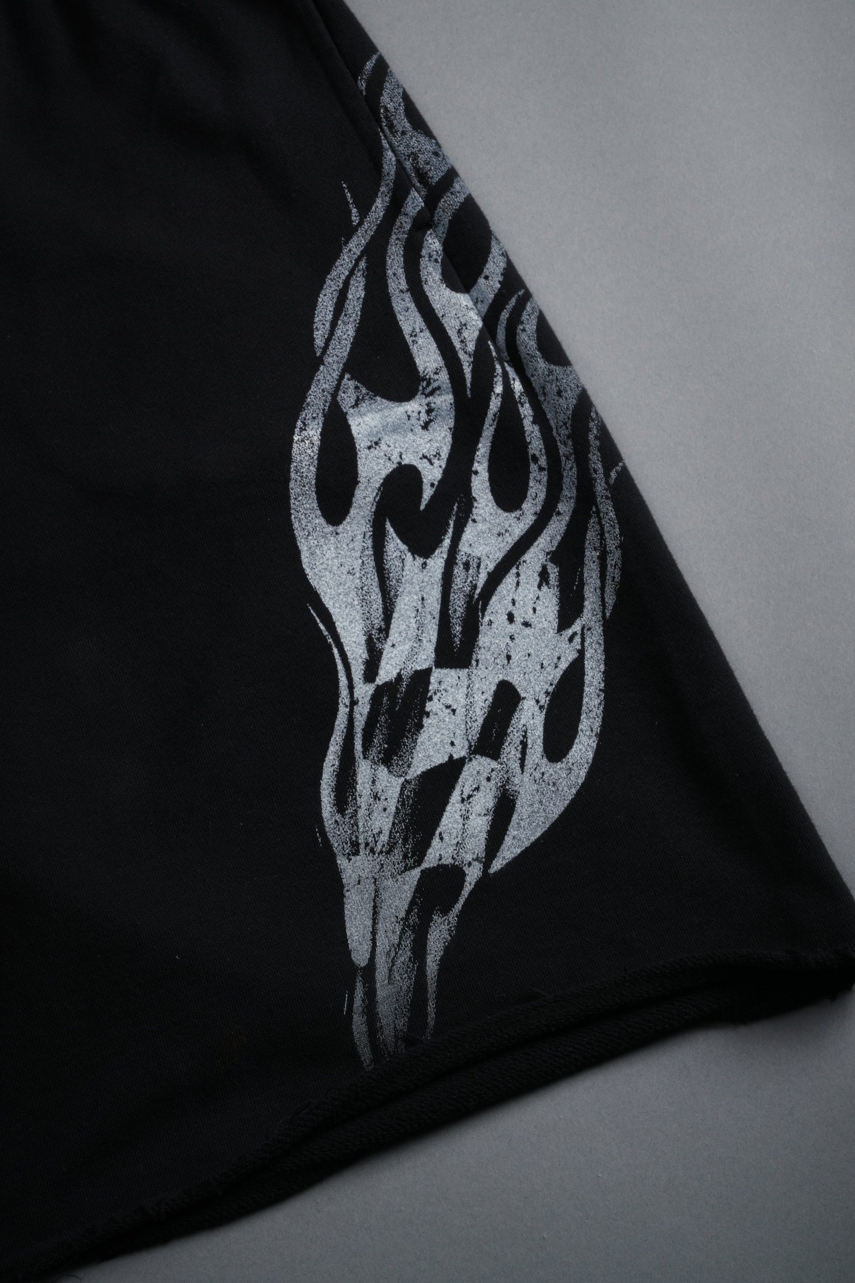 Race Inferno Grunge Oversized Raw Hem Post Lounge Sweat Shorts in Black - Image 5