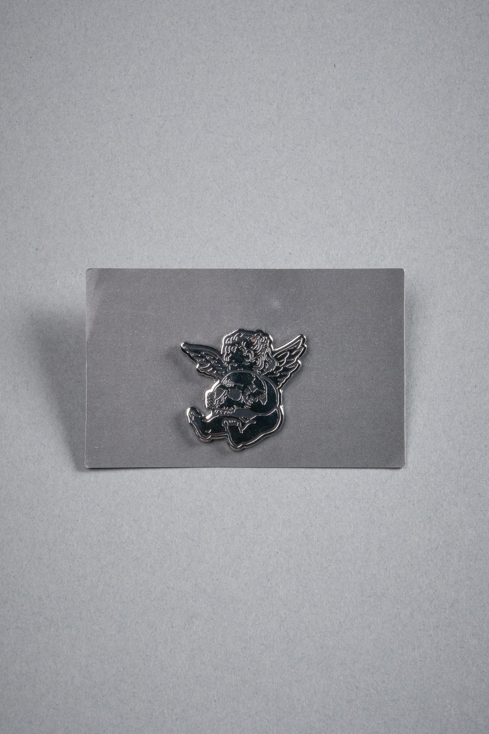 Darc Cherub Enamel Pin in Silver/Black - Image 2