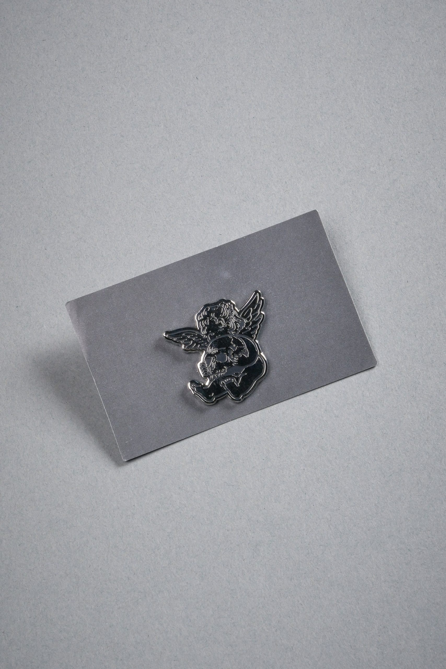 Darc Cherub Enamel Pin in Silver/Black - Image 3