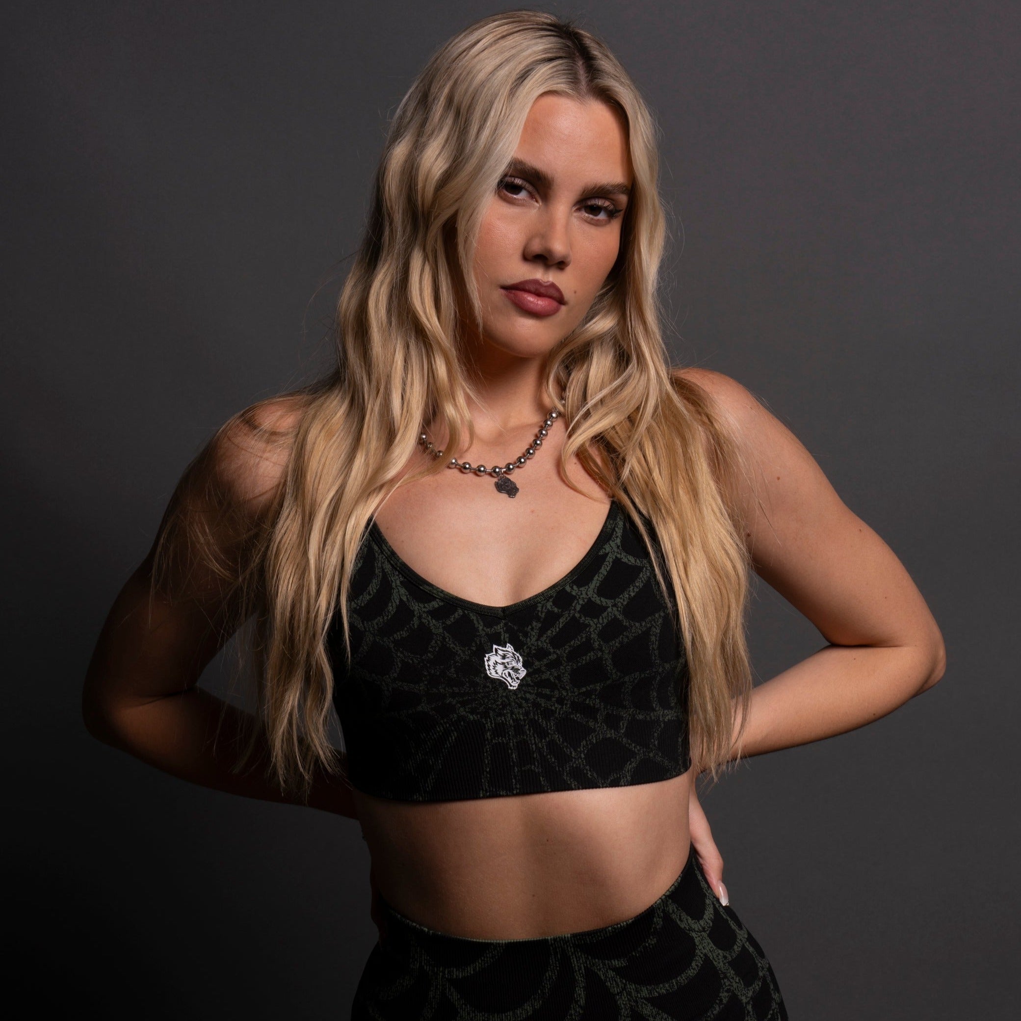 Hesh Everson Seamless Sports Bra in Black/Green Symbiote Web